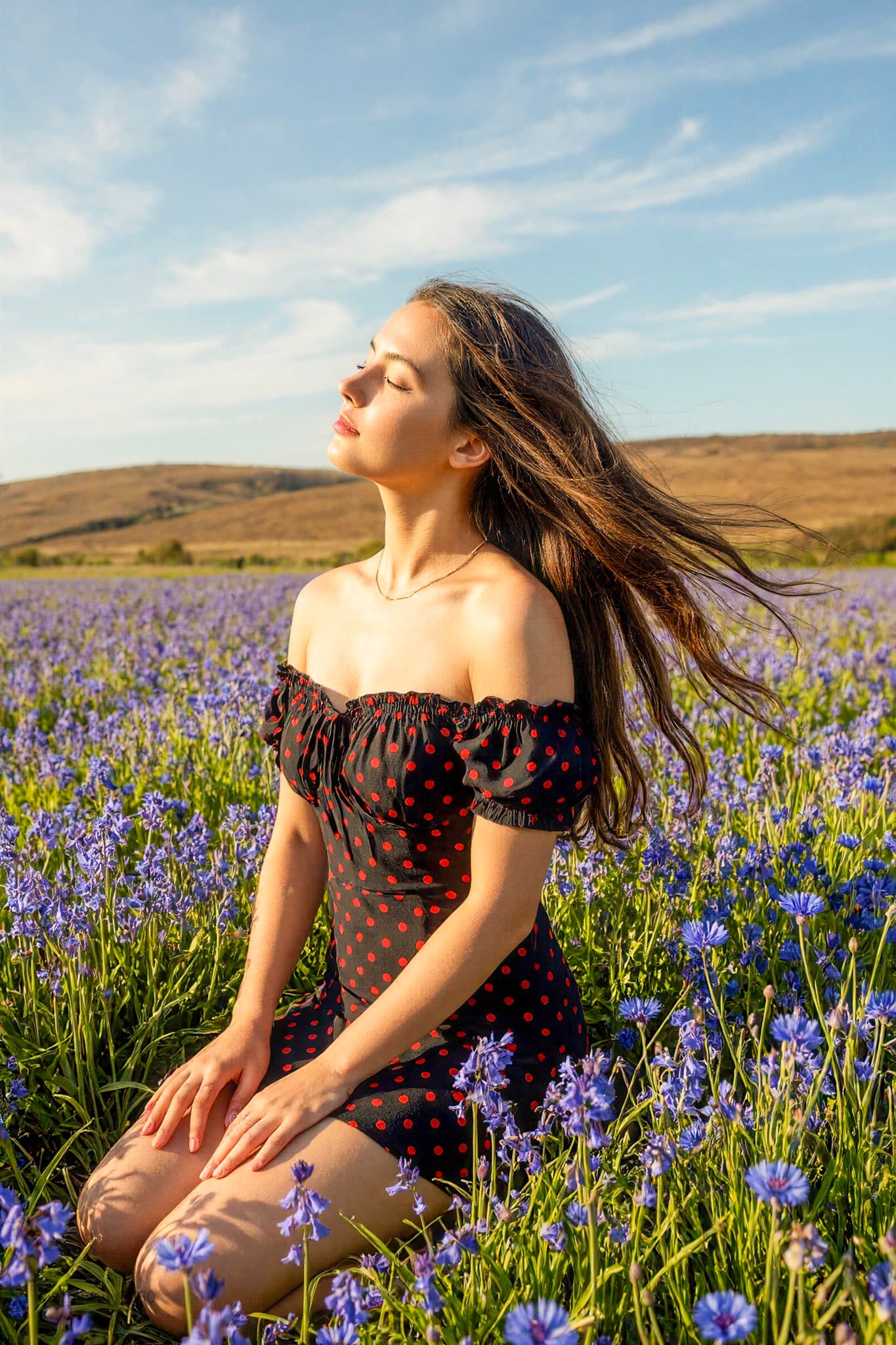 Young Woman Kneeling in a Field — Generated result