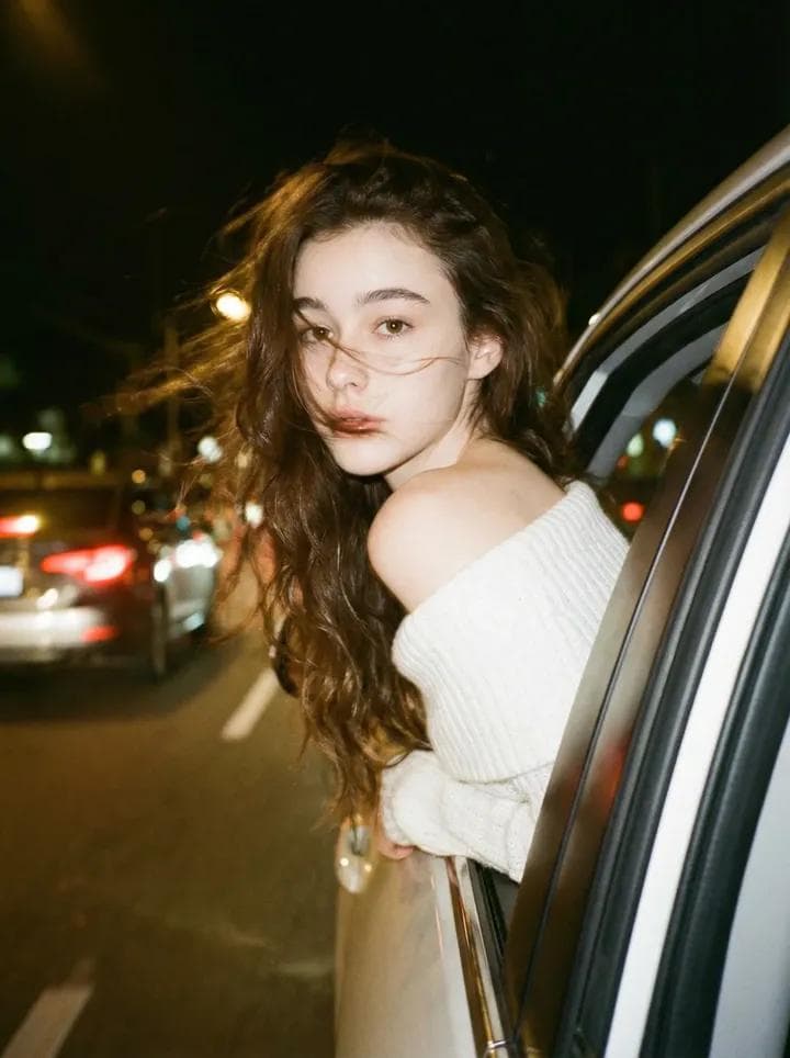 Wearing an off-shoulder white knit top — Generated result
